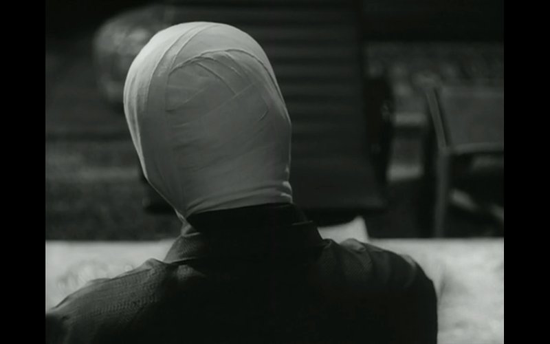 a back of a neatly bandaged head